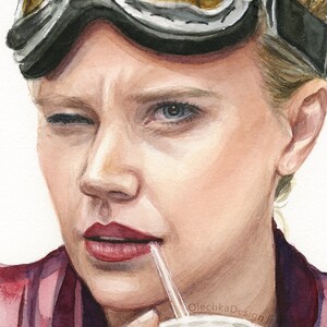 May include: A watercolor painting of a woman wearing aviator goggles and a red shirt, drinking from a cup with a straw. The woman is looking at the viewer with a slight smile and a wink. The painting is signed "OlechkaDesign" in the bottom right corner.