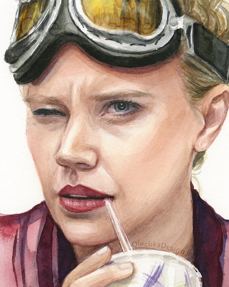 May include: A watercolor painting of a woman wearing aviator goggles and a red shirt, drinking from a cup with a straw. The woman is looking at the viewer with a slight smile and a wink. The painting is signed "OlechkaDesign" in the bottom right corner.