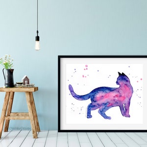 May include: Watercolor painting of a cat silhouette with a galaxy inside. The cat is facing right and has a pink and purple galaxy inside its body. The background is white with pink and purple dots.