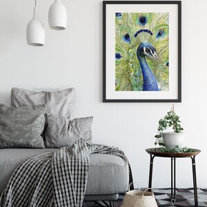 May include: Watercolor painting of a peacock with its feathers spread out. The peacock is blue and green with a white crest. The background is a light green and yellow.