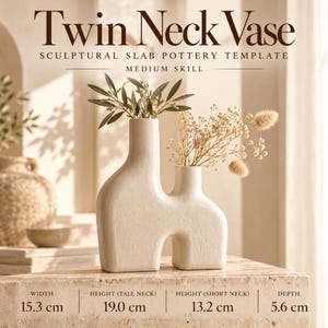 May include: A cream-colored ceramic twin neck vase with a textured surface. The vase has a tall neck and a short neck. Text reads: Twin Neck Vase, Sculptural Slab Pottery Template, Medium Skill. Dimensions: 15.3 cm width, 19.0 cm tall neck, 13.2 cm short neck, 5.6 cm depth.