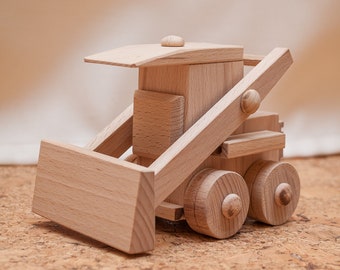 Giocattolo ecologico. Bulldozer in legno. Giocattolo di legno. Trattore in legno. Regalo per bambini. Auto di legno. Bulldozer in legno lavorato a mano. Giocattolo di legno. Auto giocattolo.