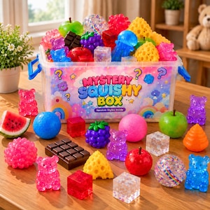 May include: A clear plastic storage container labeled Mystery Squishy Box filled with various colorful, textured, and shaped squishy toys, including gummy bears, fruit shapes, and geometric blocks, with additional loose squishy items arranged in front.