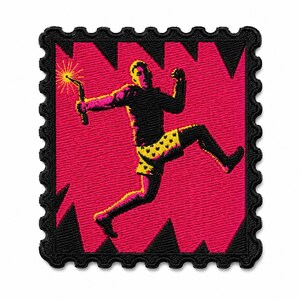 May include: A square embroidered patch with a scalloped edge featuring a black silhouette of a person jumping while holding a lit sparkler. The background is a vibrant pink with black jagged shapes, and the person wears yellow shorts.