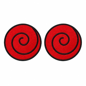 May include: Two circular embroidered patches featuring a vibrant red background with a prominent black spiral design. Each patch has a thick black stitched border, creating a clean edge for application onto fabric surfaces.