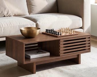 Mid-Century Modern Style Coffee Table, Walnut-Finish Table with Sliding Slatted Doors and Hidden Compartment