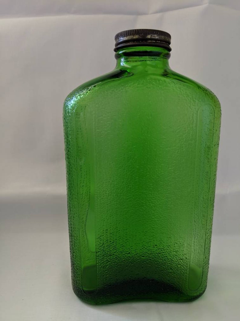 Hemingray green glass water bottle with lid c.1940's Etsy