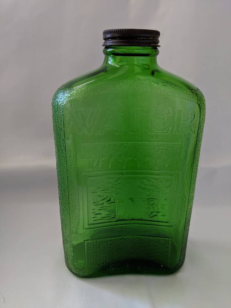 Hemingray green glass water bottle with lid c.1940's Etsy