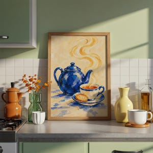May include: A framed wall art print featuring an impressionistic painting of a deep blue teapot, a matching teacup on a saucer, and a small biscuit. Wisps of steam rise from the cup against a warm, light yellow background with blue brushstrokes.