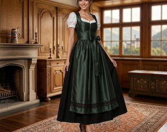 Puede incluir: Un vestido dirndl de color verde oscuro que presenta una blusa blanca con mangas cortas abullonadas, un corpiño ajustado y una falda larga. El vestido incluye un delantal verde a juego con un borde de encaje negro en el dobladillo y un lazo.