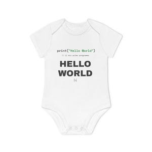 May include: A white short-sleeved baby bodysuit featuring the black text print "print("Hello World")" followed by "// il mio primo programma" and the bold black text "HELLO WORLD" with a small outlined "N" logo centered below the text.