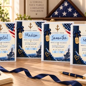 May include: Four white binders titled Letters From Boot Camp Journey with U.S. Navy branding, featuring a navy blue ribbon, a gold anchor, a heart, and a dog tag. Each binder displays a unique name, ship silhouette, and American flag graphic.