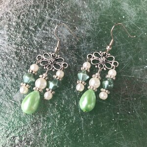Green and white pearl dangle earrings