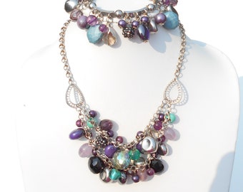 Dazzling Pomp & Power Purple, Ocean Green, Nickel, Silver Metallic colored Beaded Necklace with Filigree Teardrops and Bracelet Set!