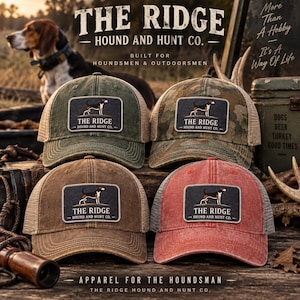 May include: Four baseball caps in olive green, camouflage, brown, and red, each featuring a rectangular patch with a hound dog illustration and the text THE RIDGE HOUND AND HUNT CO. The caps have mesh backs and distressed fabric finishes.