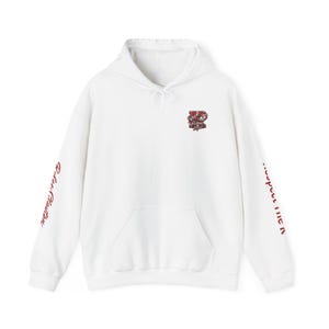 May include: A white hooded sweatshirt featuring a front kangaroo pocket and a drawstring hood. The chest displays a red and black logo with the text Kilgore College. The right sleeve has red text, and the left sleeve has red text.