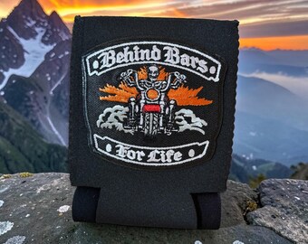 Behind bars for life: black motorcycle can cozie, koozie.