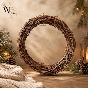 May include: A circular wreath constructed from thin, intertwined brown twigs. The wreath features a natural, woody texture with a hollow center, showcasing a simple, unadorned design made from dried natural branches arranged in a continuous loop.