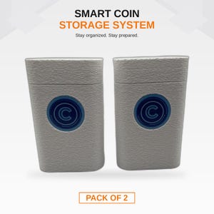 May include: Two rectangular light grey coin storage containers with a textured surface. Each container features a circular blue emblem with a letter C in the centre. The text SMART COIN STORAGE SYSTEM, Stay organised. Stay prepared. and PACK OF 2 appear.