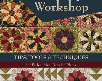 May include: A book titled Dresden Quilt Workshop by Susan R. Marth, featuring the subtitle Tips, Tools & Techniques for Perfect Mini Dresden Plates. The cover displays a colorful patchwork quilt design with various floral and geometric patterns.