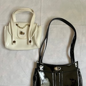 White patent leather purse top