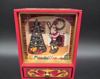 Vintage geanimeerde kerstman-muziekdoos met lade | Werkend kersthaarddiorama speelt 'We Wish You A Merry Christmas' | Retro uit de jaren 80