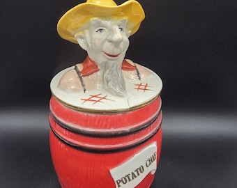 Vintage Regal China aardappelchipsbus uit de jaren 1950 met afbeelding van opa en oma.