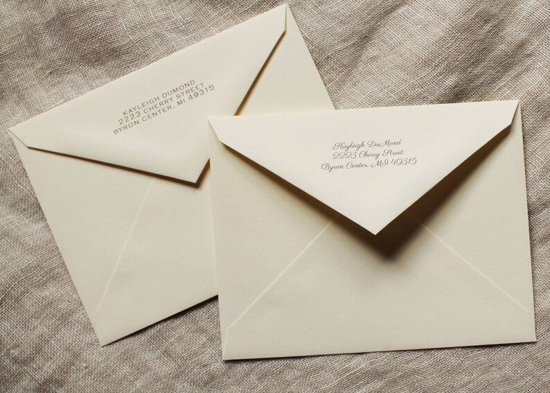 May include: Two white envelopes with handwritten addresses. The top envelope has the address Kayleigh Dumond, 2223 Cherry Street, Byron Center, MI 49315. The bottom envelope has the address Hayleigh Don Mond, 2923 Cherry Street, Byron Center, MI 49315.