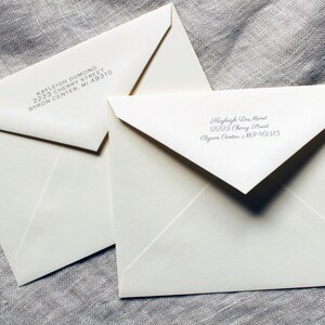 May include: Two white envelopes with addresses written on them. The top envelope has the address "KAYLEIGH DUMOND 2223 CHERRY STREET BYRON CENTER, MI 49315". The bottom envelope has the address "Hayleigh Dru Mond 2923 Chevy Street Byron Center, MI 49315".