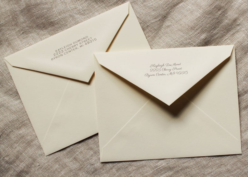 May include: Two white envelopes with handwritten addresses. The top envelope has the address Kayleigh Dumond, 2223 Cherry Street, Byron Center, MI 49315. The bottom envelope has the address Hayleigh Don Mond, 2923 Cherry Street, Byron Center, MI 49315.