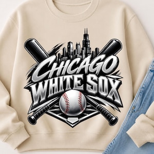May include: A beige crewneck sweatshirt featuring a graphic print of the Chicago skyline, two crossed black baseball bats, and a white baseball with red stitching. The text CHICAGO WHITE SOX is printed in a bold, metallic silver font.