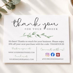 May include: A rectangular white thank you card featuring black script and serif text, a green watercolor leaf illustration, and social media icons. The card includes a 10% discount code, website, email, and social media handle placeholders for business use.