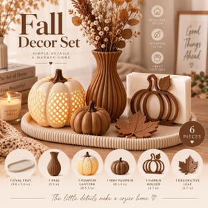May include: A six-piece fall decor set featuring a 9.8 by 5.9 inch oval tray, a 5.5 inch vase, a 5.3 inch diameter pumpkin lantern, a 3.9 inch diameter mini pumpkin, a 4.7 inch pumpkin napkin holder, and a 4.7 inch decorative leaf.