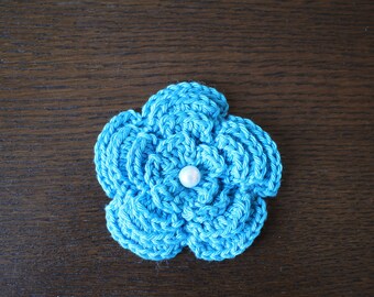 3D crochet flower in turquoise with pearl approx 8cm