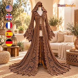 May include: A brown, floor-length, hooded crochet duster cardigan featuring intricate floral patterns, wide bell sleeves, and a front tie closure with tassels. The garment is displayed on a mannequin and includes the text ShaniiDesigns.
