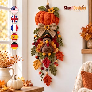 May include: A crochet wall hanging featuring a large orange pumpkin at the top, adorned with green leaves and a small yellow flower. Below, a brown turkey wearing a black hat is surrounded by colorful crochet oak leaves and red berries.