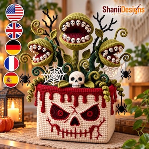 May include: A crochet plant pot featuring a skull face with red button eyes and a stitched mouth, topped with three green carnivorous plants with open mouths lined with tiny white skulls, black spider accents, and white spider webs.