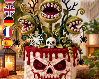May include: A crochet plant pot featuring a skull face with red button eyes and a stitched mouth, topped with three green carnivorous plants with open mouths lined with tiny white skulls, black spider accents, and white spider webs.