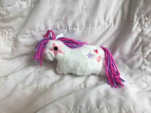 fluffy unicorn doll