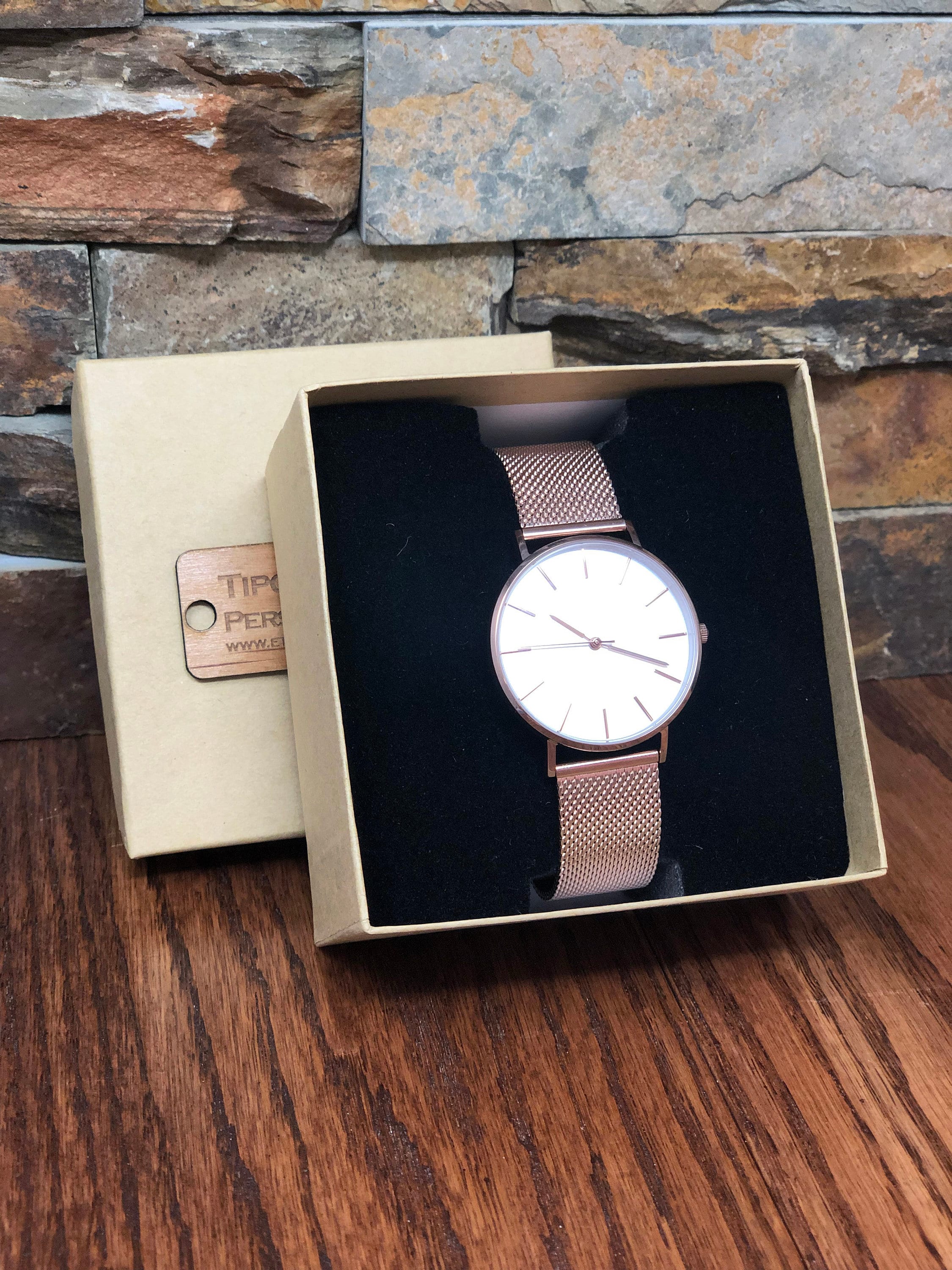 engraved wrist watch