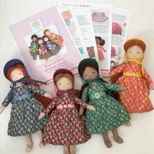 May include: Four 12-inch dolls wearing different floral print dresses and bonnets. The dolls have brown hair and are wearing brown shoes. The dolls are arranged in a circle on a white surface. The image also includes a printed pattern for a dress and bonnet.
