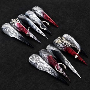 Red and Black Lace Press On Nails, Long Stiletto Set with Silver Tone Rings, Spike Bars and Ornate Charms for Gothic Party Manicures