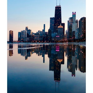 "Vanishing Point" by Ami Watanabe. Photo of Chicago skyline seen from the north and reflected in Lake Michigan.