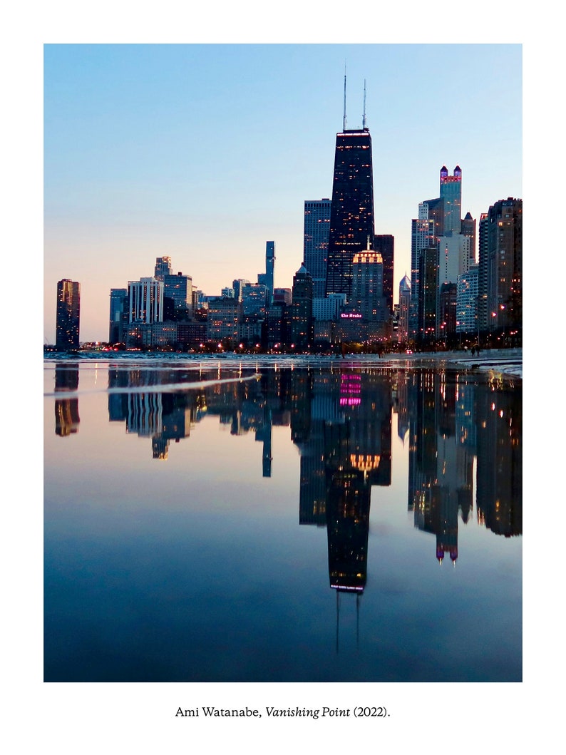 "Vanishing Point" by Ami Watanabe. Photo of Chicago skyline seen from the north and reflected in Lake Michigan.