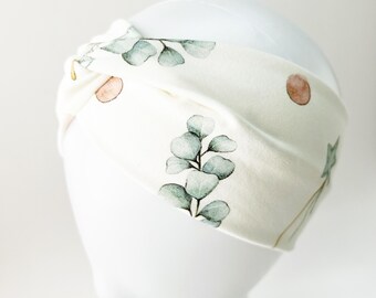 Twist Top Headband In Off White Floral and Star pattern.