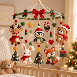 May include: A Christmas-themed crochet baby mobile featuring a central ring adorned with a red bow, holly leaves, and berries. Hanging elements include a reindeer, a penguin, a bear, a rabbit, a fox, Christmas trees, stars, hearts, and candy canes.