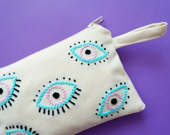 evil eye makeup bolsa