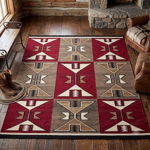 May include: A rectangular area rug featuring a geometric pattern in deep red, tan, and cream colours. The design consists of repeating symmetrical shapes with sharp angles and black accents, arranged in a grid-like layout across the entire surface.