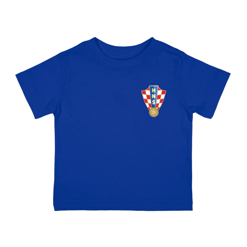 May include: A royal blue toddler t-shirt with a white and red Croatian Football Federation (HNS) logo on the left chest.
