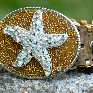 Jodi's Jems signature starfish on gold beads.